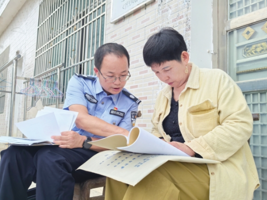 以脚步为尺 以法治暖心 ——记“湖南省记一等功人员”谭伟红